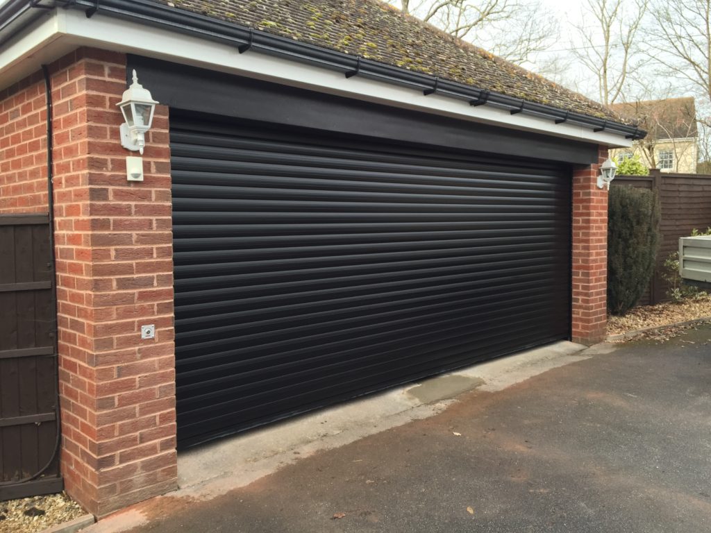 Aluroll insulated roller garage door in Black.