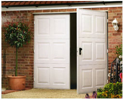 Picture of White Garador  Steel Georgian design side hinged garage doors on pre-fitted steel frame