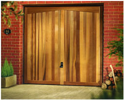 Garador Barrington Cedar garage door on dark brown steel fixing frame