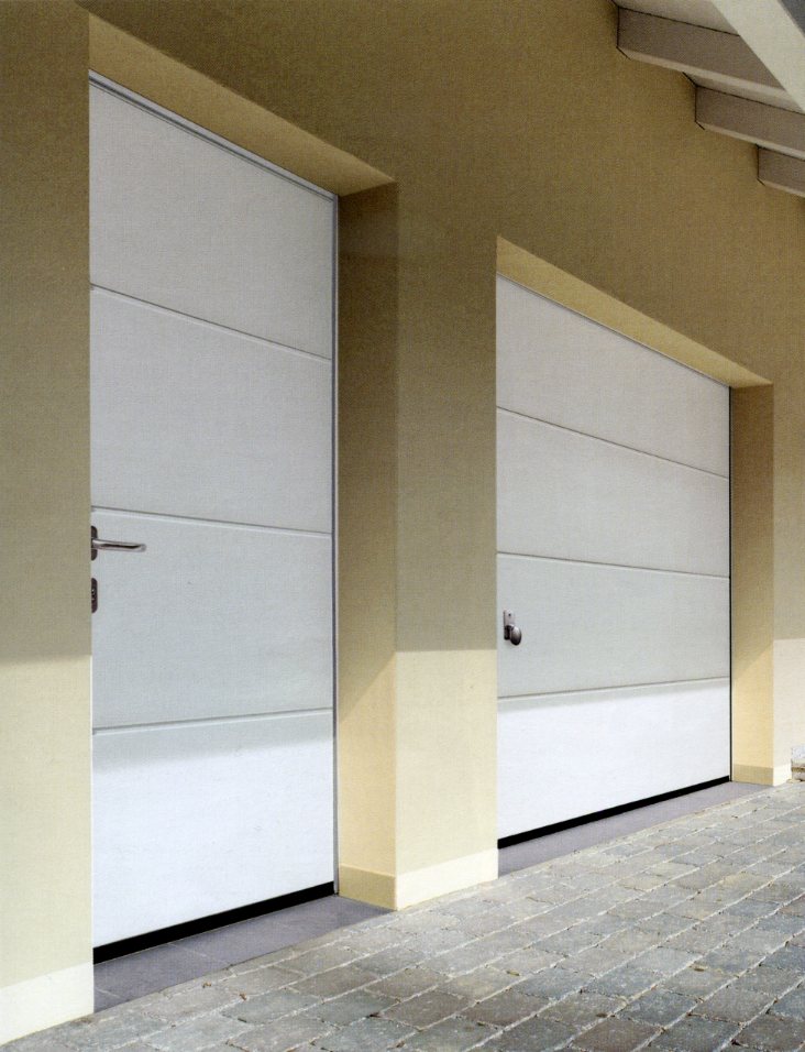 Picture showing matching L-Rib sectional garage door and side door