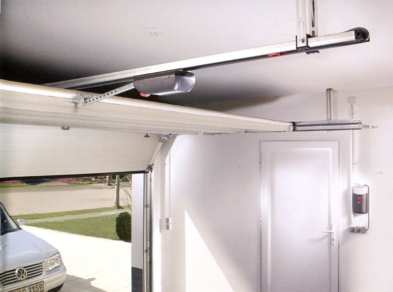 Picture of Ryterna sectional garage door from inside, showing electric motor