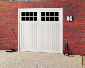 A white glass reinforced plastic garage door