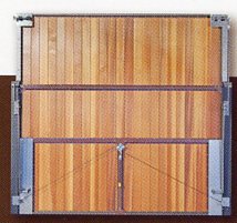 Photo of a Rear of retractable panel built Woodrite door with steel bracings. 