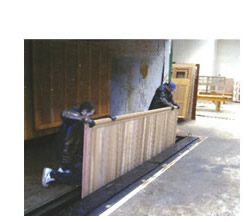 Picture showing method of dip coating a Cedar garage door