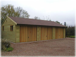 Woodrite side-hinged timber garage doors installed by Mark 