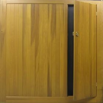 Cedar Door Bakewell garage door with Wicket