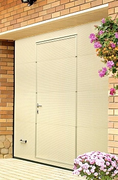 Alutech L-Rib Woodgrain Sectional garage door with Wicket