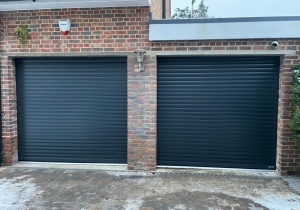 Y1: 2 Aluroll Classic Insulated Roller Garage Doors in RAL 7016 – Anthracite Grey.