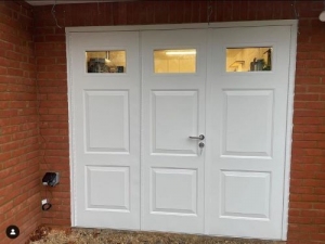 A2: BGID York style side hinged garage doors with clear windows